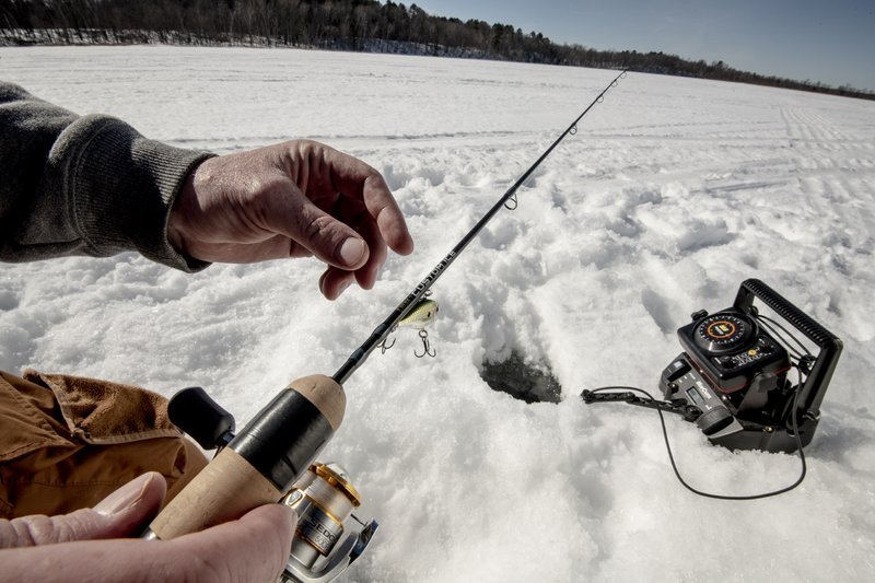 Image: Experience the Thrills of Ice Fishing in Canada's Frozen Wilderness